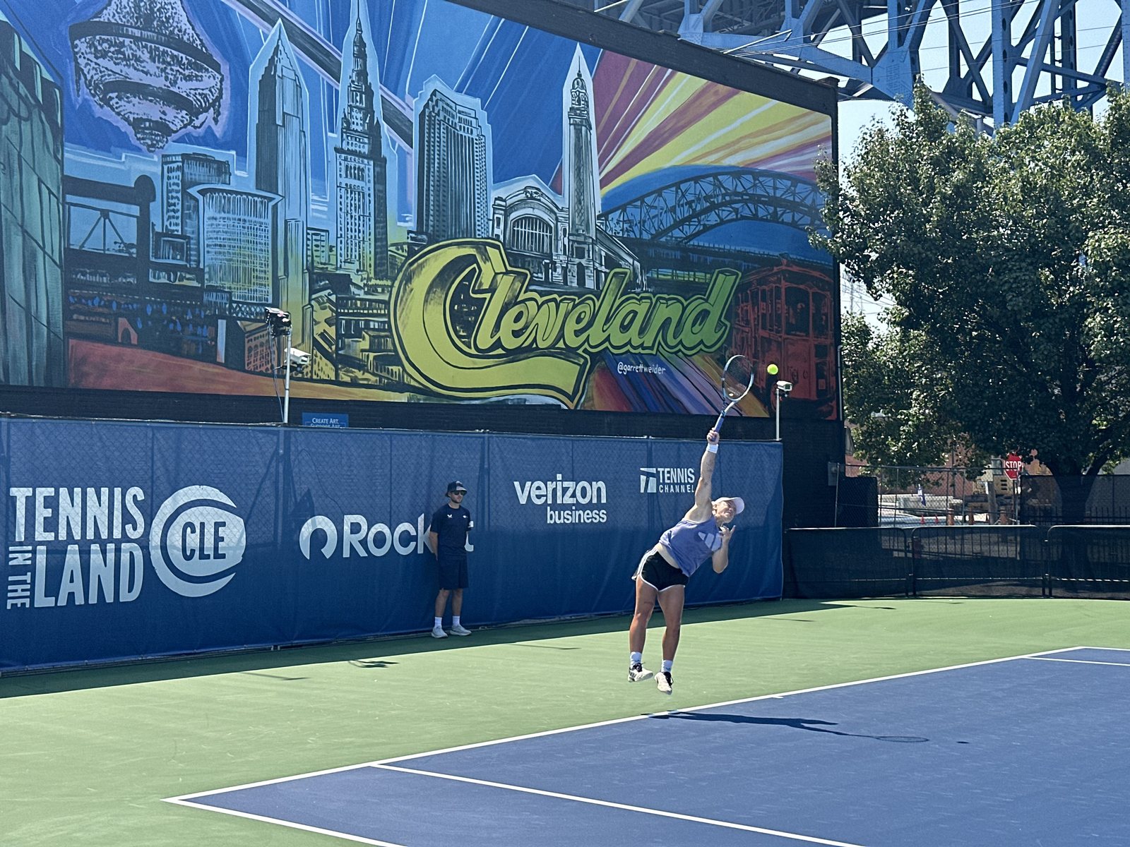A player serving at a tour event